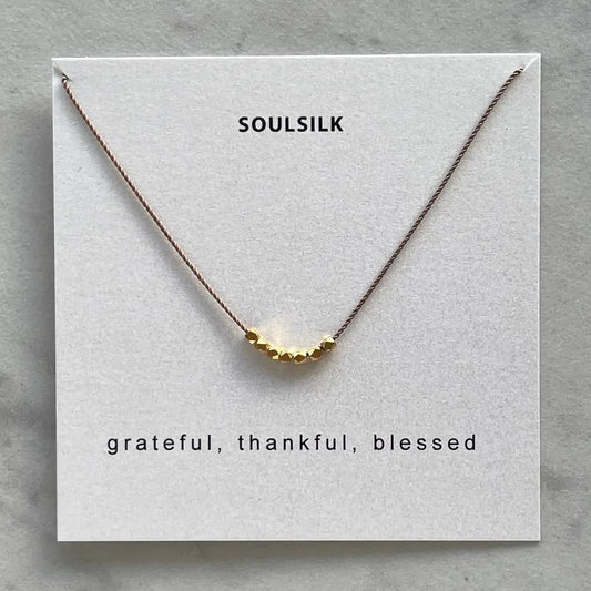 Floating Gold Nuggets Nylon Necklace